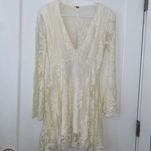 Free people dress. Cream color, adjustable V neck depth. Size 0